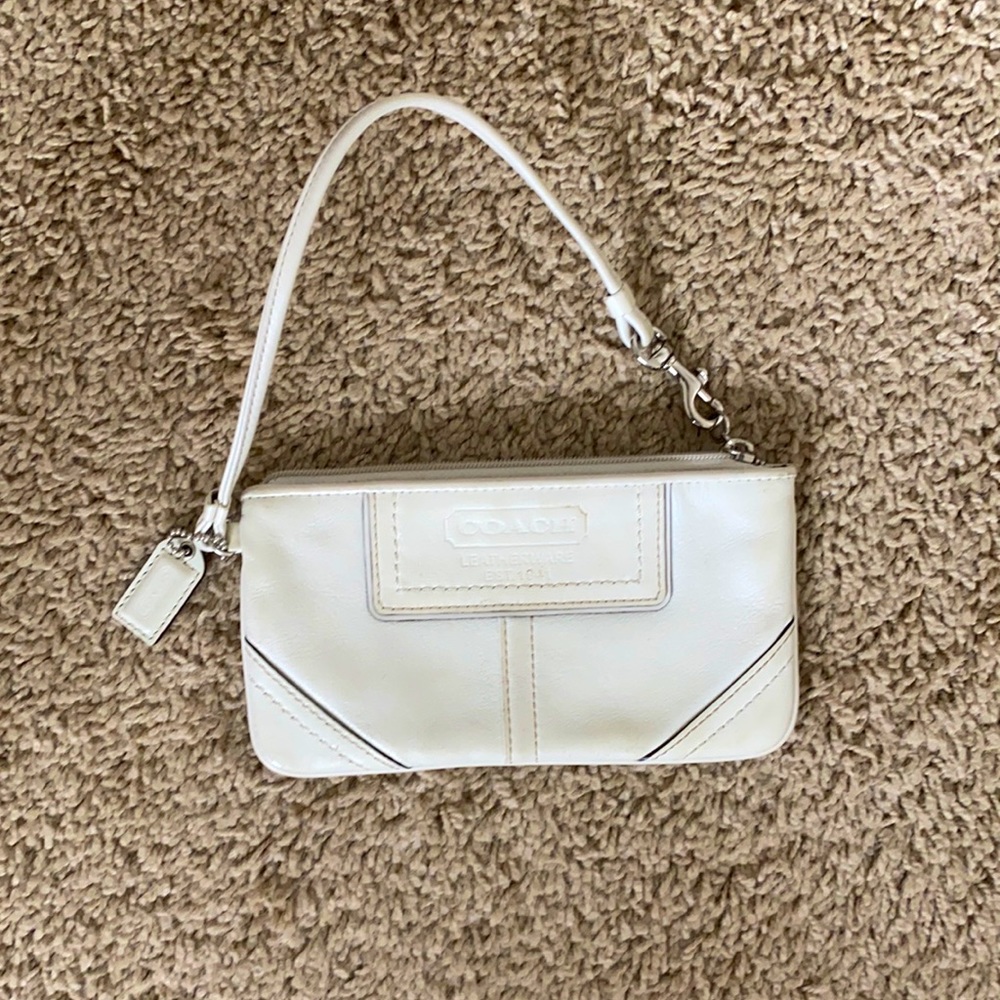 Coach leatherware wristlet with silver accent